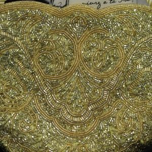 Handmade golden beaded handbag
